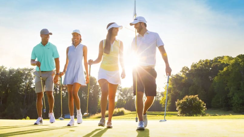 Couples enjoying a round of gold at Edgewater.